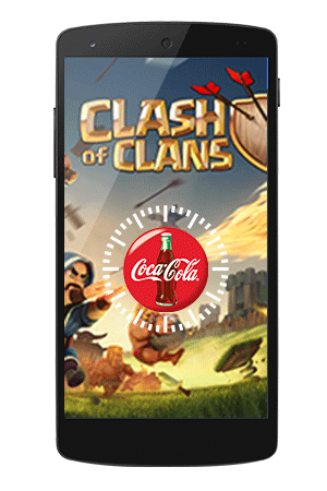 Mobile phone with Clash of Clans game and Coke spinner